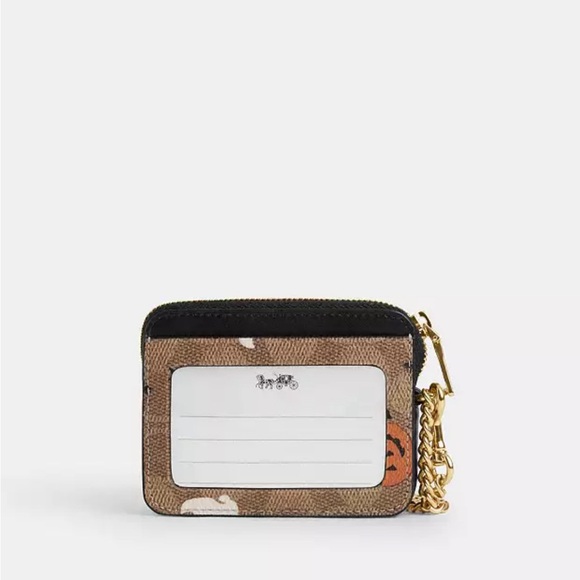 COACH
Zip Card Case In Signature Canvas With Halloween Print 2024 - Picture 2 of 5